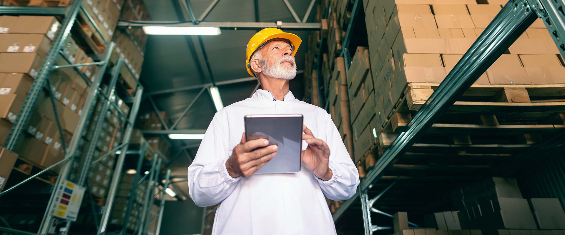 Man walking with a tablet marking what air ducts need Commercial air duct cleaning in Elizabethtown