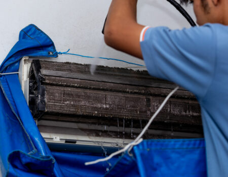 a technician providing Professional Coil Cleaning in Hershey